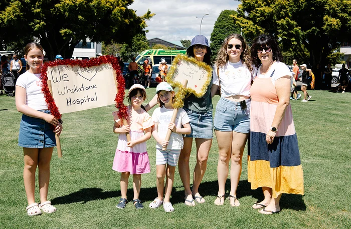 WHANAU TURNOUT: Families turned out to the hikoi with crafted signs to support local hospital staff and mothers.