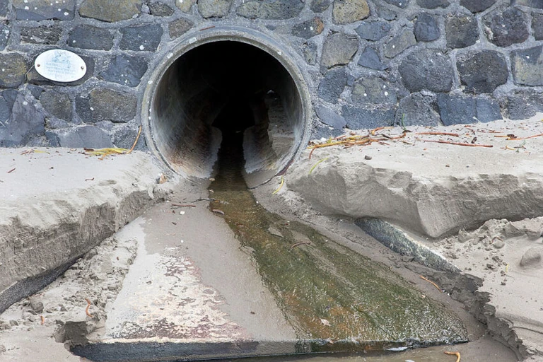 A stormwater outlet at Browns Bay in Auckland (Photo: Dave Rowland/Getty Images)