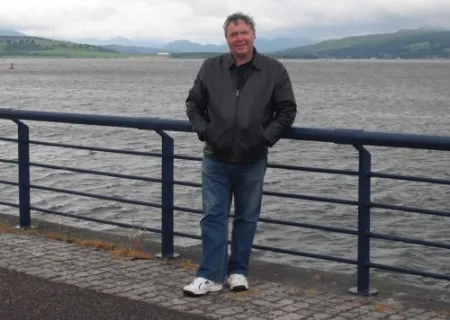 Me in Greenock after putting some carnations (my father's favorite flower) in the Clyde where the ashes of his parents, my grandparents, were placed.