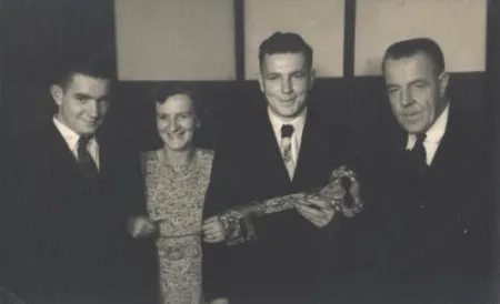 My father receiving his 21st key from my grandfather, my grandmother to the left and my uncle next to her